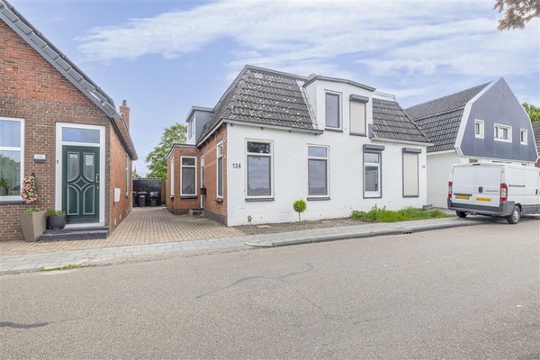 Te koop: Sfeervolle 2 onder 1 kapwoning met vrij zicht over landerijen !